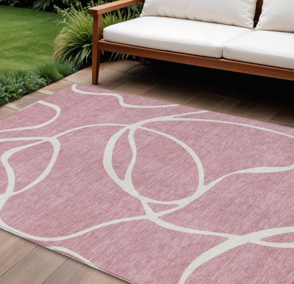 10' X 14' Pink And Ivory Abstract Washable Indoor Outdoor Area Rug