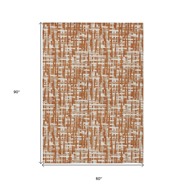 5' X 8' Terra Cotta Tan And Ivory Abstract Washable Indoor Outdoor Area Rug
