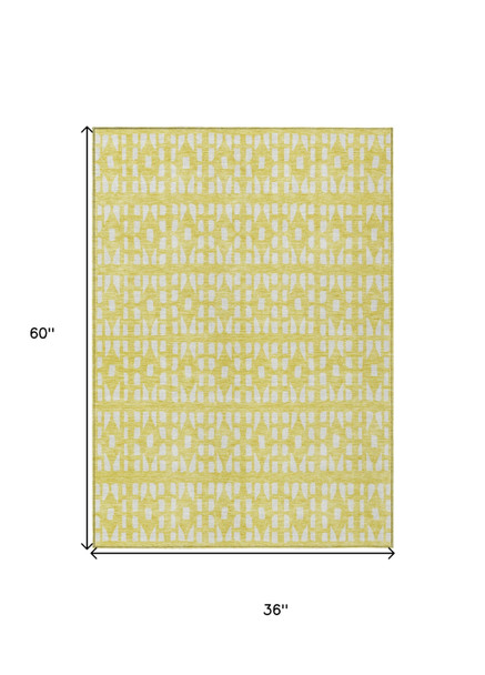 3' X 5' Yellow And Ivory Geometric Washable Indoor Outdoor Area Rug