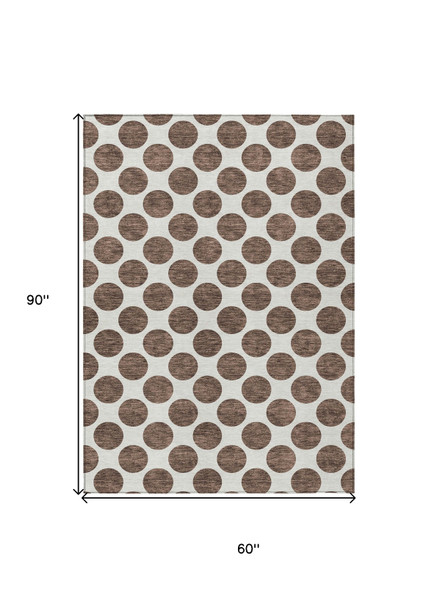 5' X 8' Brown And Ivory Polka Dot Washable Indoor Outdoor Area Rug