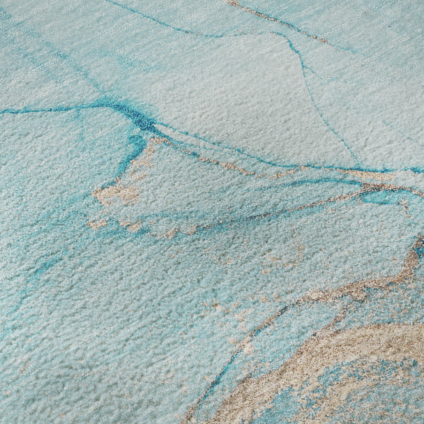5' X 8' Teal And Ivory Abstract Washable Area Rug With UV Protection