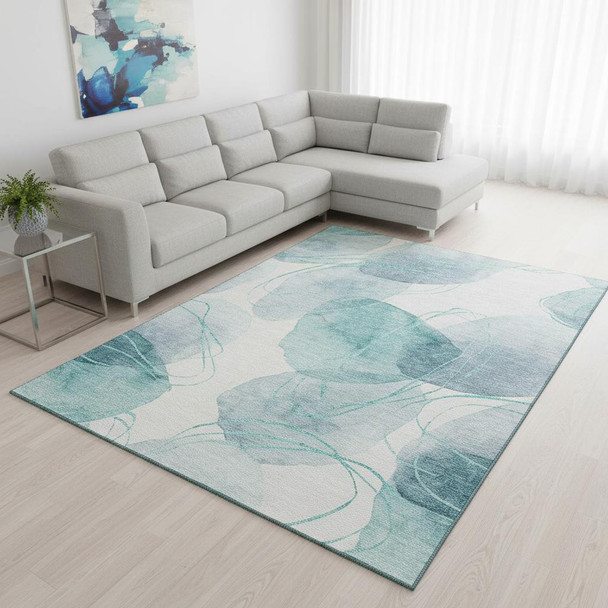 10' X 14' Teal And Ivory Abstract Washable Area Rug With UV Protection