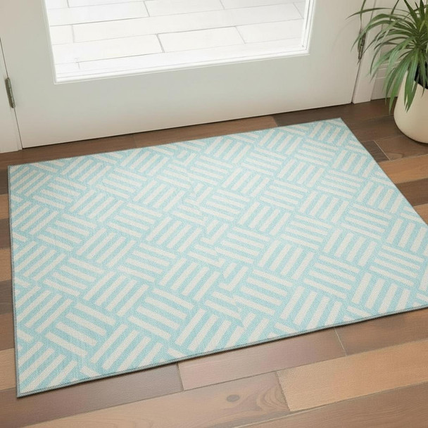 3' X 5' Aqua And Ivory Geometric Washable Area Rug With UV Protection