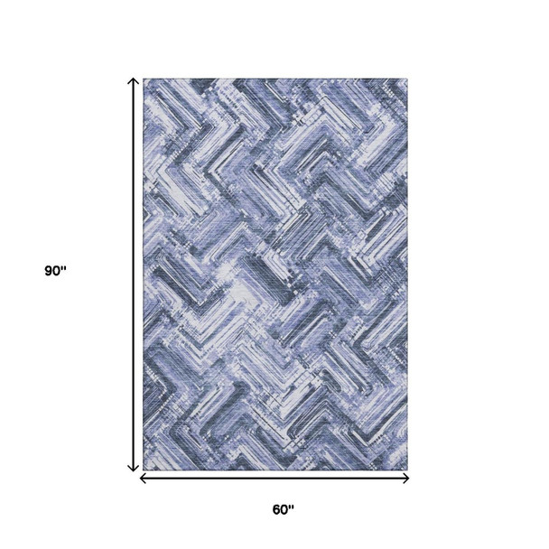 5' X 8' Blue And Ivory Chevron Washable Area Rug With UV Protection
