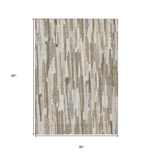 3' X 5' Ivory And Beige Striped Washable Indoor Outdoor Area Rug