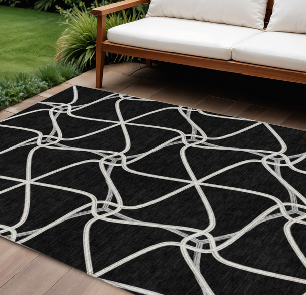 8' X 10' Black And Ivory Geometric Washable Indoor Outdoor Area Rug