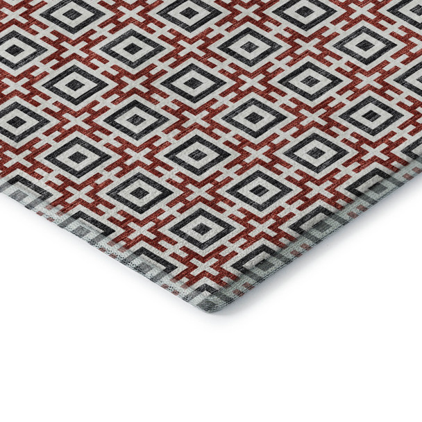 5' X 8' Red Black And Ivory Geometric Washable Area Rug With UV Protection
