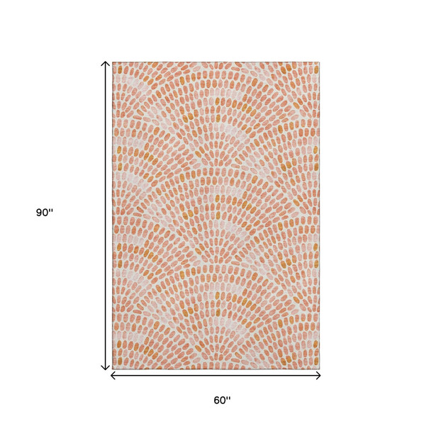 5' X 8' Peach And Ivory Geometric Washable Area Rug With UV Protection