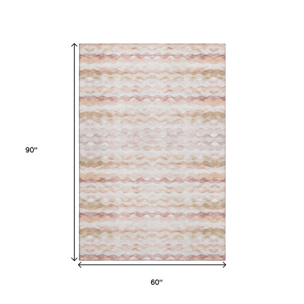 5' X 8' Peach Ivory And Beige Geometric Washable Area Rug With UV Protection