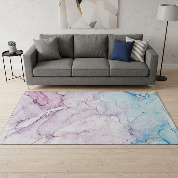 5' X 8' Purple Blue And Ivory Abstract Washable Area Rug With UV Protection