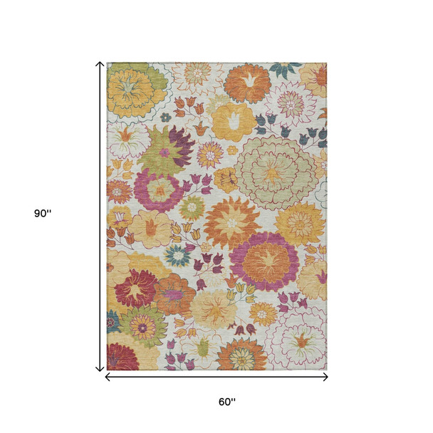 5' X 8' Ivory Gold And Pink Floral Washable Indoor Outdoor Area Rug