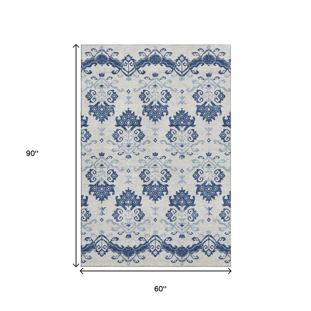 5' X 8' Navy Blue And Ivory Medallion Washable Area Rug With UV Protection