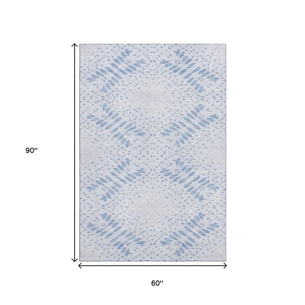 5' X 8' Blue And Ivory Floral Washable Area Rug With UV Protection