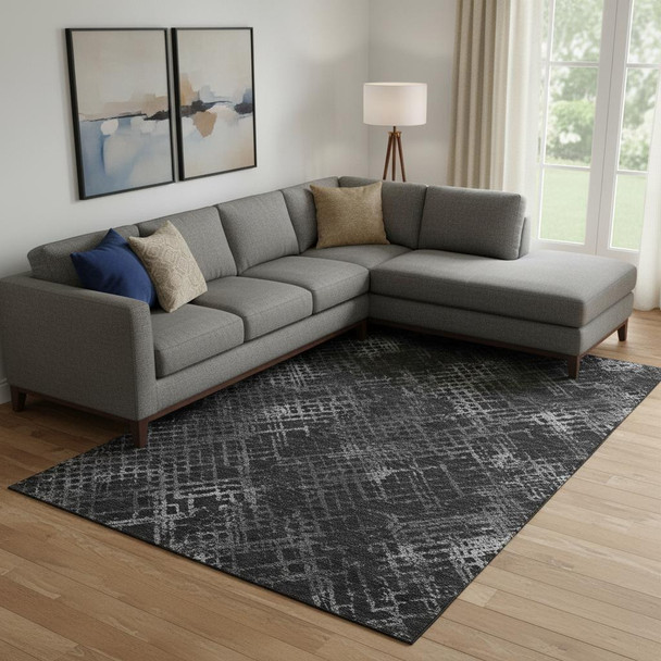 10' X 14' Charcoal And Ivory Abstract Geometric Washable Area Rug With UV Protection