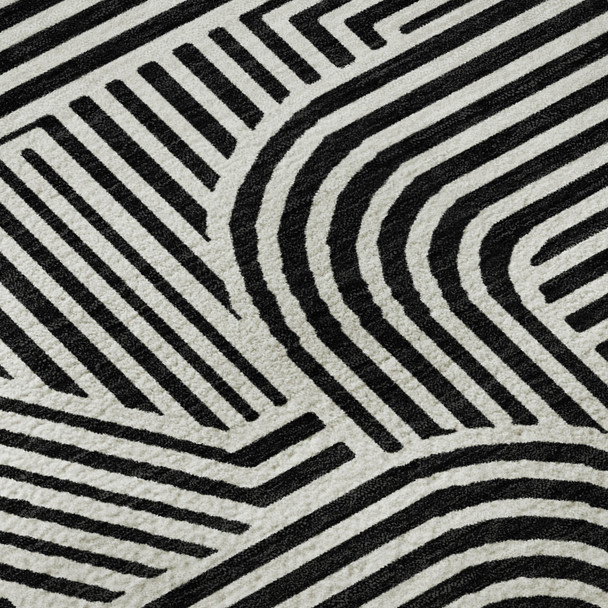 8' Black And Ivory Abstract Geometric Washable Round Rug With UV Protection