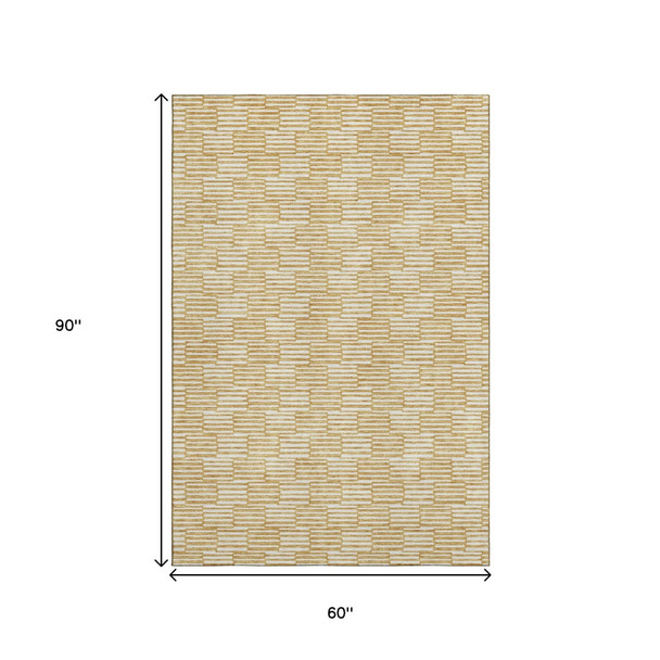 5' X 8' Gold And Ivory Abstract Geometric Washable Area Rug With UV Protection