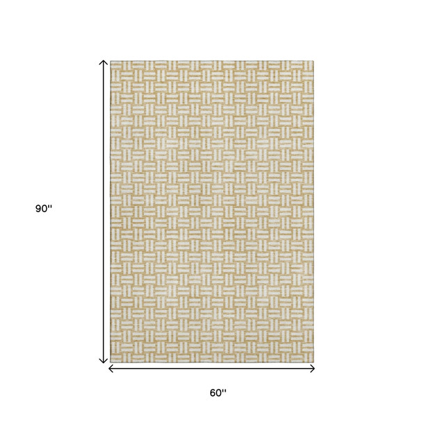 5' X 8' Gold And Ivory Abstract Geometric Washable Area Rug With UV Protection