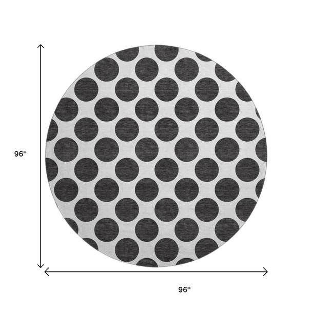 8' Black And Ivory Polka Dot Washable Round Rug With UV Protection