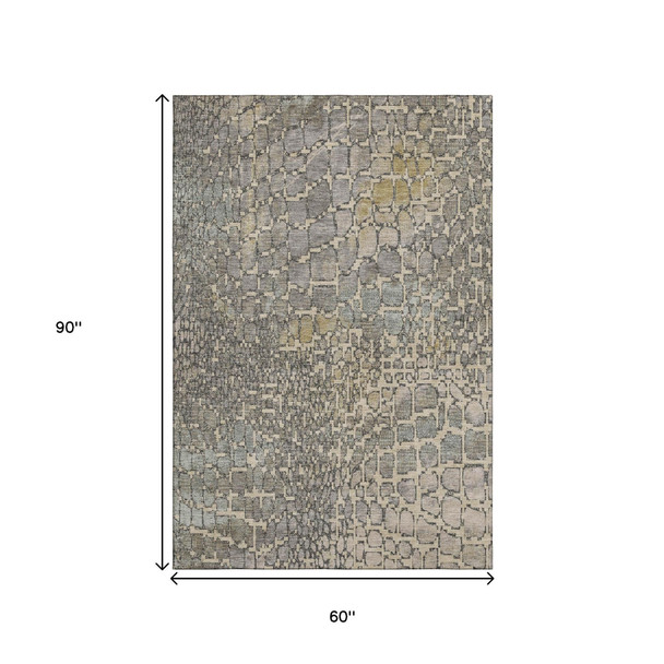 5' X 8' Beige Taupe And Ivory Abstract Geometric Washable Area Rug With UV Protection