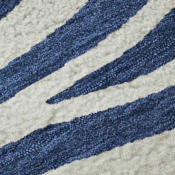 9' X 12' Navy Blue And Ivory Animal Print Washable Area Rug With UV Protection