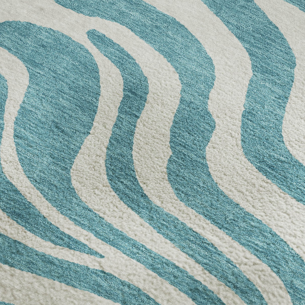 5' X 8' Teal And Ivory Animal Print Washable Area Rug With UV Protection