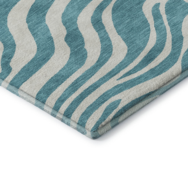 8' X 10' Teal And Ivory Animal Print Washable Area Rug With UV Protection