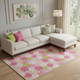 9' X 12' Pink Green And Ivory Polka Dot Washable Area Rug With UV Protection