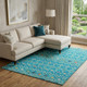 8' X 10' Teal Gold And Green Southwestern Washable Area Rug With UV Protection