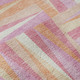 5' X 8' Blush Peach And Ivory Geometric Washable Area Rug With UV Protection