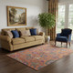 5' X 8' Orange Blue And Pink Oriental Washable Area Rug With UV Protection