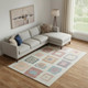 10' X 14' Peach Ivory And Blue Geometric Washable Area Rug With UV Protection