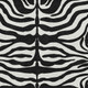 3' X 5' Black And Ivory Animal Print Washable Area Rug With UV Protection