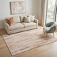 5' X 8' Pink Yellow And Peach Striped Washable Area Rug With UV Protection