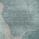 5' X 8' Teal And Beige Abstract Washable Area Rug With UV Protection