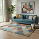5' X 8' Navy Blue Orange And Red Geometric Washable Area Rug With UV Protection
