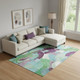 10' X 14' Teal Purple And Green Abstract Washable Area Rug With UV Protection