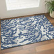 3' X 5' Navy Blue And Ivory Animal Print Washable Area Rug With UV Protection