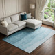 10' X 14' Teal And Ivory Ombre Washable Area Rug With UV Protection