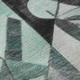 9' X 12' Teal Black And Ivory Abstract Washable Area Rug With UV Protection