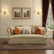 41" Beige Velvet Curved Sofa And Toss Pillows With Natural Legs