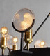Black And Gold Unique Statement Eight Light Metal Chandelier With Clear Shades