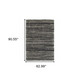 5' X 8' Charcoal Silver And Grey Geometric Shag Power Loom Stain Resistant Area Rug