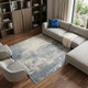 7' X 10' Ivory Gray And Blue Abstract Area Rug