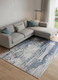 9' X 12' Ivory Blue And Black Abstract Power Loom Distressed Area Rug