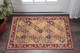 2' X 3' Red Orange And Black Quatrefoil Area Rug