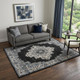 5' X 7' Black Floral Power Loom Distressed Area Rug