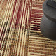 5' X 7' Tan Black and Red Striped Non Skid Area Rug
