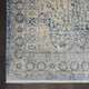 5' X 8' Blue And Ivory Floral Non Skid Area Rug With Fringe