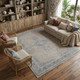 9' X 13' Gray Blue and Taupe Oriental Power Loom Worn Faded Area Rug With Fringe