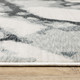 10' X 13' Blue Black And Ivory Abstract Area Rug With Fringe